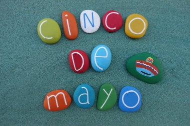 Cinco de Mayo, unique logo idea with a composition of colored stones over green sand clipart