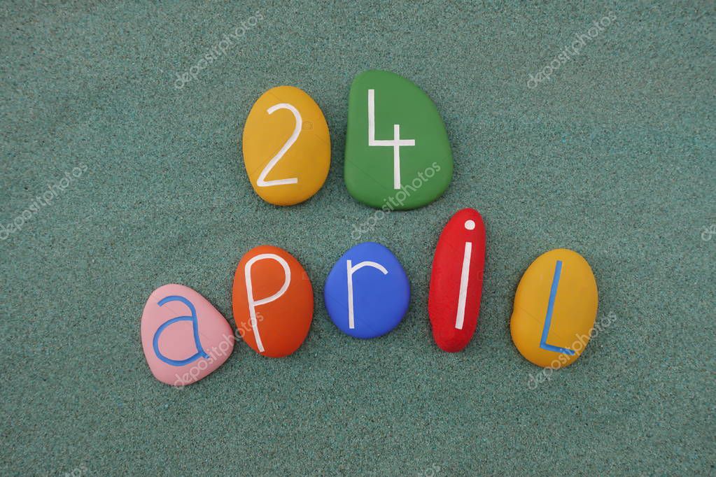 24 April, calendar date with colored stones over green sand