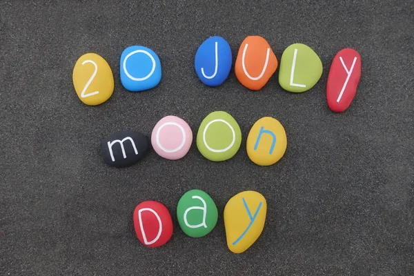 20 July, moon day, National Moon Day commemorates the day man first walked on the moon in 1969 with a colorful composition of stones over black volcanic sand