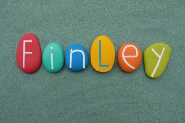 Finley is both a surname and given name. Its meaning is of Scottish origin, from the Gaelic personal name Fionnlagh. Celebration with handmade colored stone letters over green sand