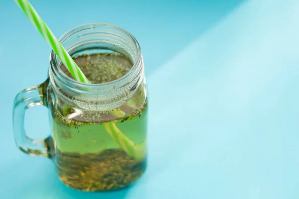 Green Herbs Tea Blue Background Light Window — Stock Photo, Image