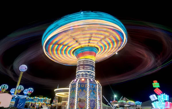 Carousel spinning fast — Stock Photo, Image