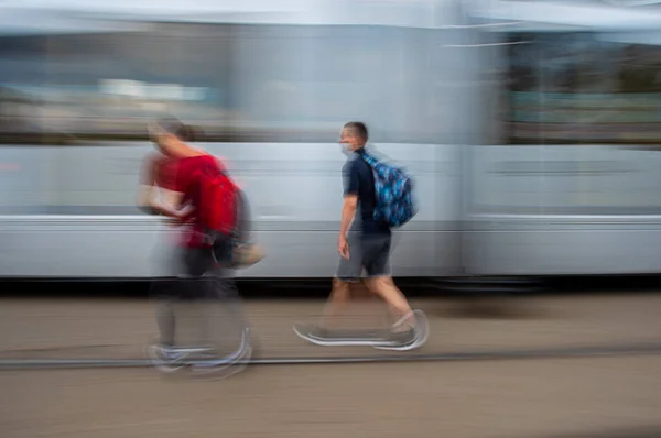 Unrecognizable people on the move — Stock Photo, Image
