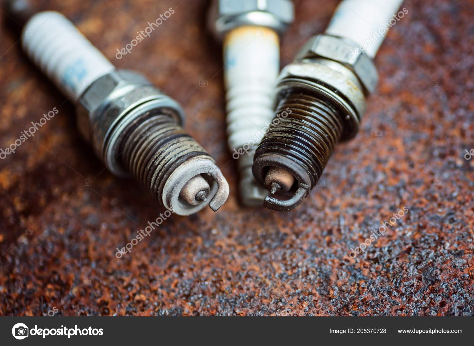 Old Broken Car Spark Plugs Car Repair Replacement Spark Plugs Stock Photo by ©djedzura 205370728