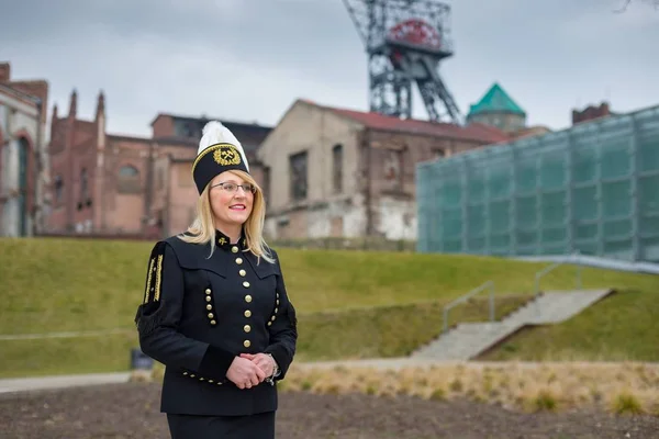 Woman black coal miner foreman in gala parade uniform, Silesia, Poland