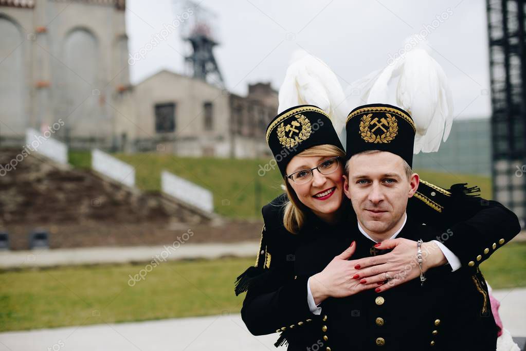 Black coal miners family in gala parade uniforms, Silesia, Poland