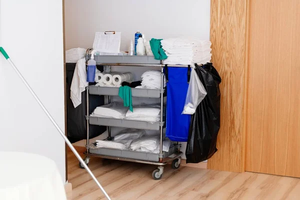 Hotel room maid trolley with towels