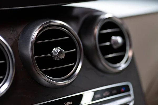 Modern luxury car air vents.