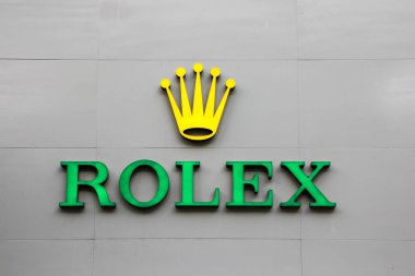 Bangkok, Tayland - 29 Eylül 2018: Rolex izlemek işareti ve binanın logosuna. Marka kalite saatler için ünlüdür.