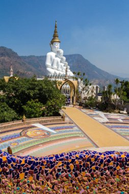 Five white Buddha statues