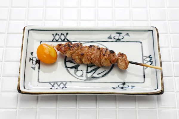 yakitori, japanese grilled chicken skewers, very rare chouchin (immature egg yolk)