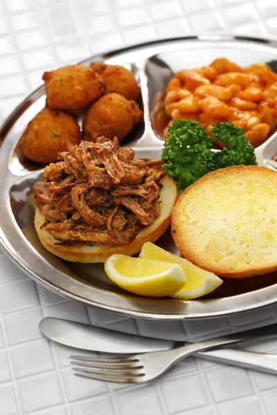 North Carolina Barbecue Plate Pulled Pork Hush Puppies Baked Beans — Stock Photo, Image