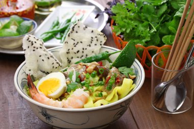 homemade Mi Quang; Vietnamese rice noodle cuisine clipart