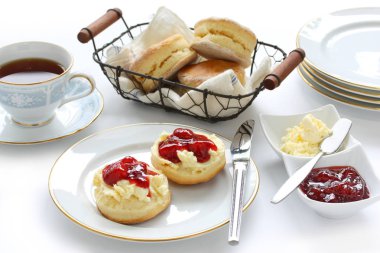 scone with strawberry jam and clotted cream , tea party , afternoon tea , buttermilk biscuits clipart