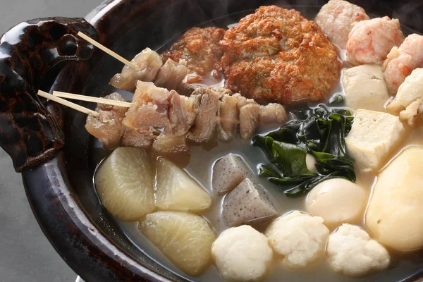 Oden is a popular Japanese hot pot, which includes daikon radish, hanpen (fish cakes), chikuwa (fish cakes), boiled eggs, konnyaku(yam cake), and more.