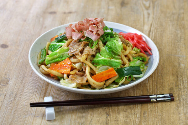 yaki udon , a kind of  japanese udon noodle dish, pan fried udon noodles with meat and vegetables