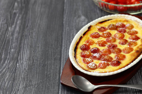 traditional cherry clafoutis, contains pits of the cherries