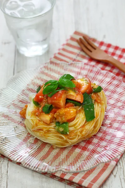 summertime chilled style, capellini pasta with fresh tomatoes and basil