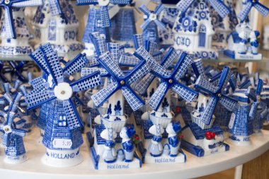 Typical Delft blue in a souvenir shop in Delft, The Netherlands clipart