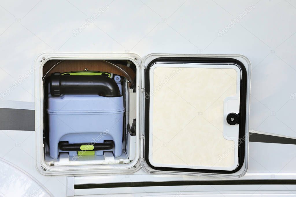 Toilet tank for the restroom inside a motorhome
