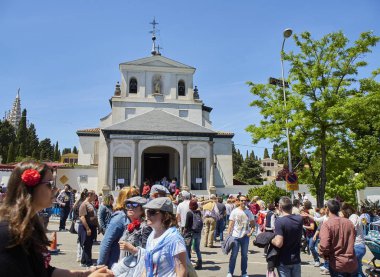Madrid, Spain - May 15, 2018. Citizens honoring its patron, Saint  Isidro Labrador, in San Isidro chapel of Madrid during the San Isidro festivity fair. clipart