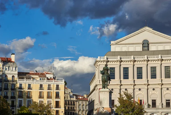 The Royal Theatre (Teatro Real or simply El Real) and Monument to Felipe IV in foreground. Plaza de Oriente Square. Madrid, Spain.