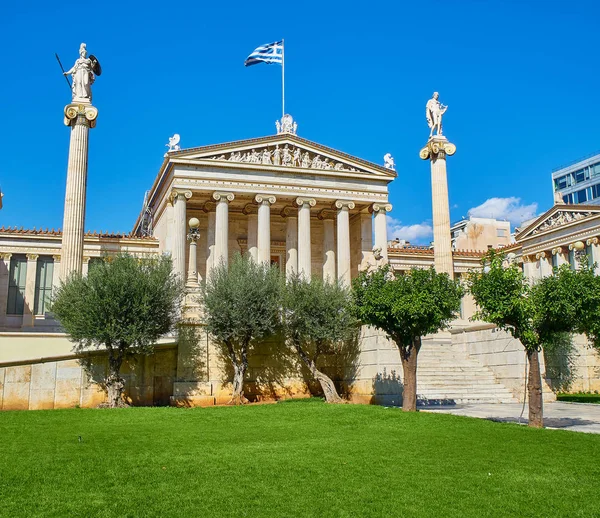 Principal facade of The Academy of Athens, Greece National academy, flanked by Athena and Apollo pillars. Athens, Attica region, Greece.