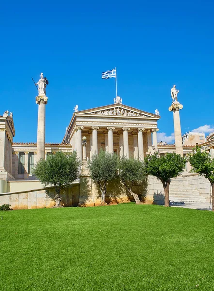 Principal facade of The Academy of Athens, Greece National academy, flanked by Athena and Apollo pillars. Athens, Attica region, Greece.