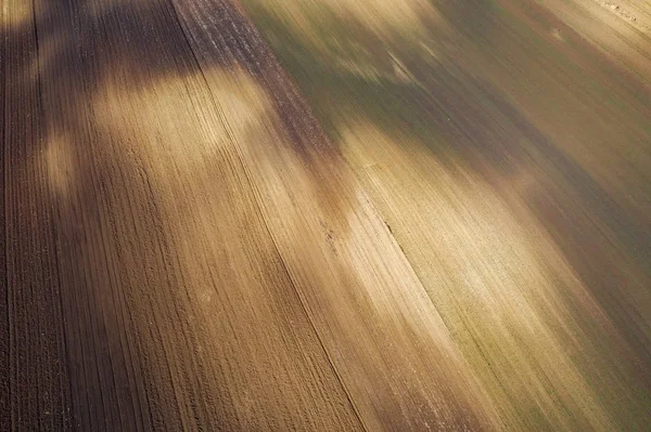 Aerial drönarvy upplöjd jord terräng — Stockfoto