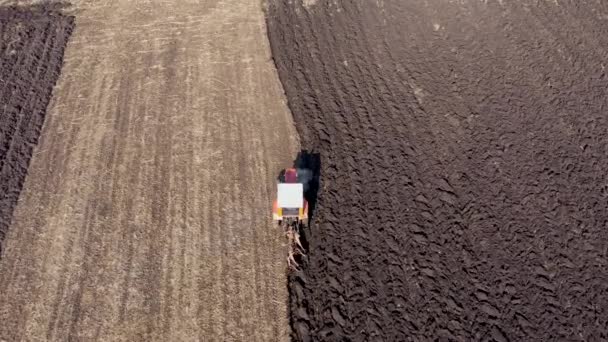 Aerial Top View Tractor Combine Harvester Plowing Agricultural Land Spring — Stock Video