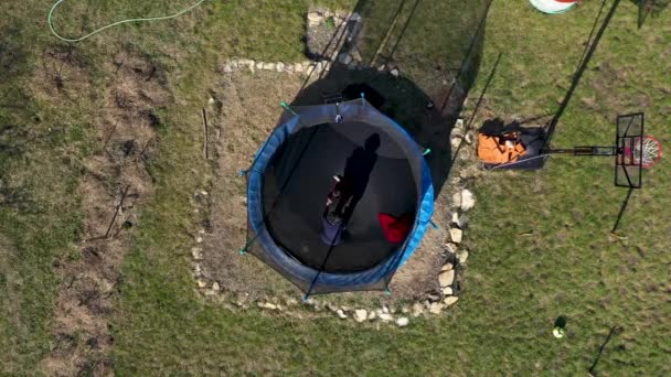 Aerial Point View Mother Her Daughter Having Fun Jumping Trampoline — Stock Video