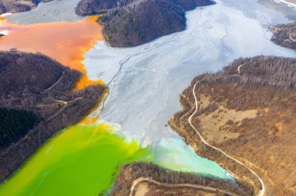 Aerial view of a lake filled with chemical waste water — Stock Photo, Image