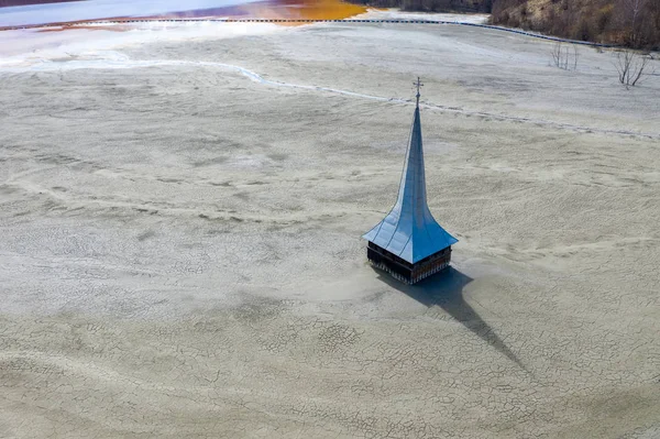 Aerial view of flooded and abandoned church — Stock Photo, Image