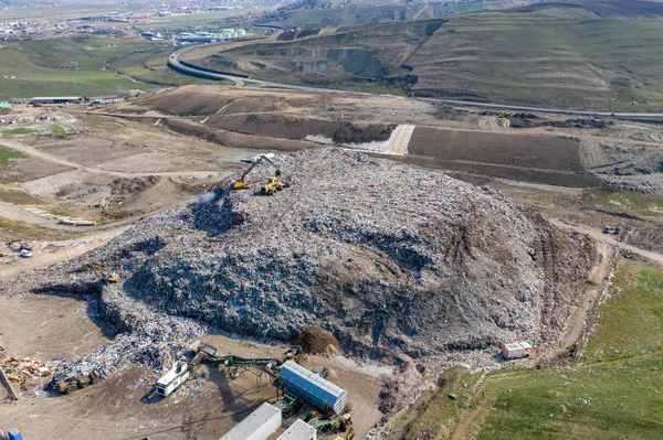Aerial view of large landfill. Waste garbage dump, environmental