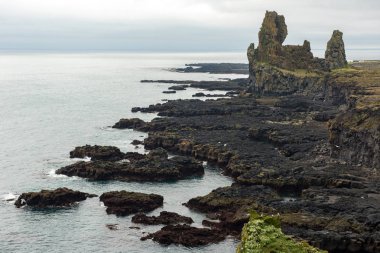Londrangar Basalt Cliffs in Iceland clipart