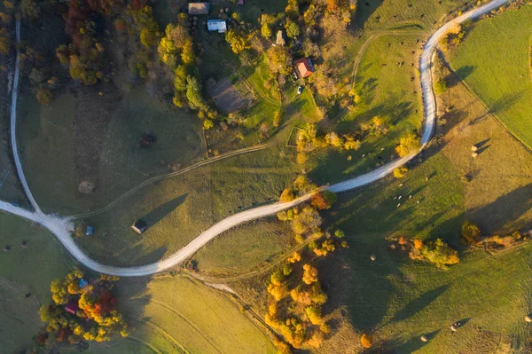Idyllic aerial drone shot of autumn countryside hills — Stock Photo, Image