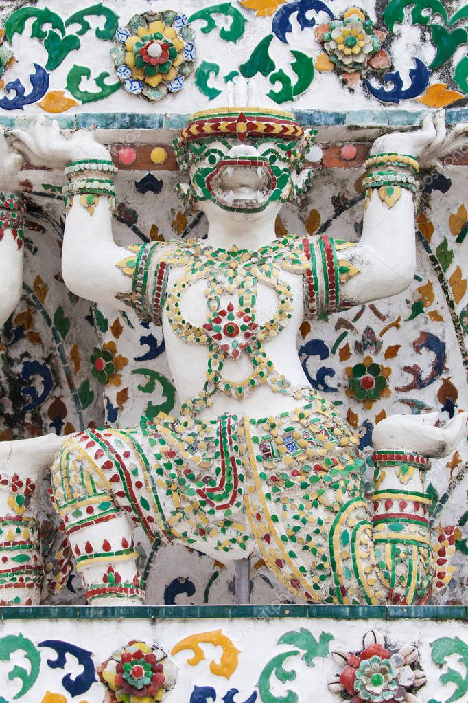 Statue of a Monkey supporting a Prang at Wat Arun