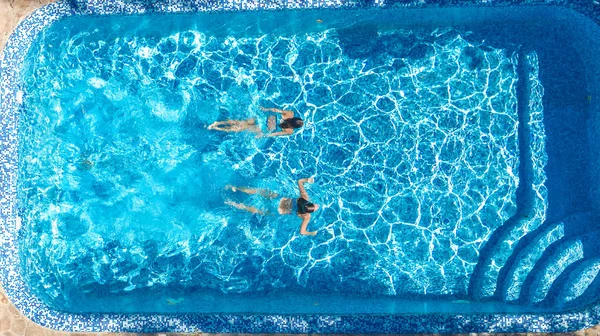 Active Girls Swimming Pool Water Aerial Drone View Children Swim — Stock Photo, Image