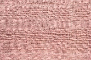 Basit, büyük dokuma, pürüzlü doku. Desensiz solmuş arka plan, ev yapımı materyal. Organik kumaş, tekstil.