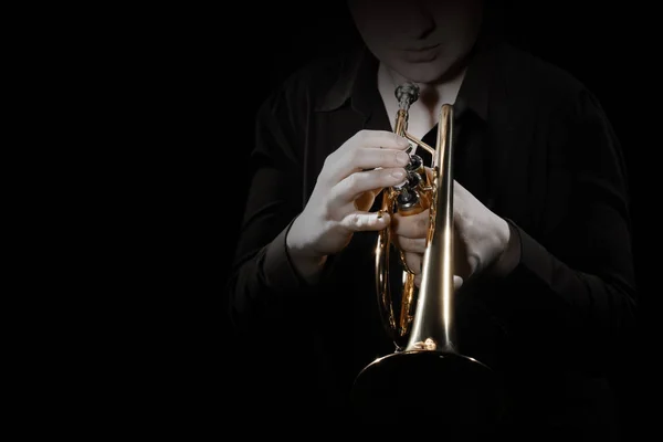 Trumpet player orchestra brass instrument. Playing jazz music instrument closeup