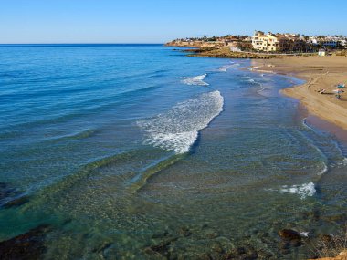 Popular great summer vacation travel destination La Zenia Beach Orihuela Costa South Spain clipart