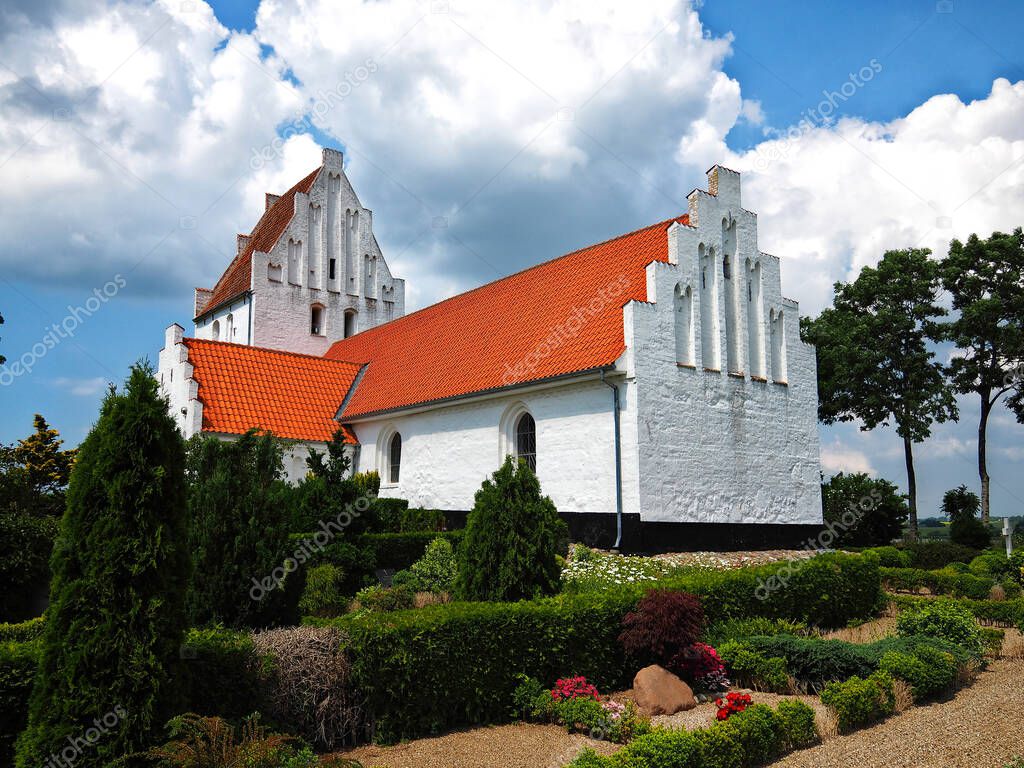 Typical country classical style church to serve local small community Funen Denmark