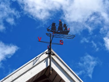 Classical traditional design Marine weather vane made of iron with the flag of Denmark - space for graphics and text clipart
