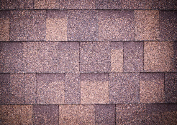 roof of new brown shingles background and texture. vignette