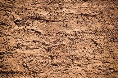 döngüsü bisiklet lastiği ile kumlu yolu skeç ile izler. arka plan, doku