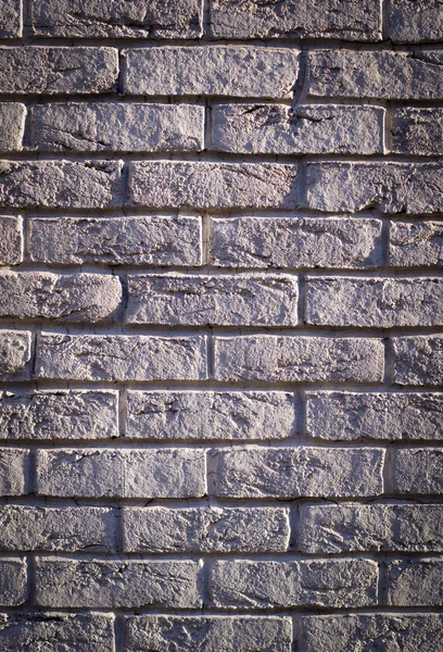 Muur Van Witte Verweerde Stenen Met Schaduwen Vignet Achtergrond Textuur — Stockfoto