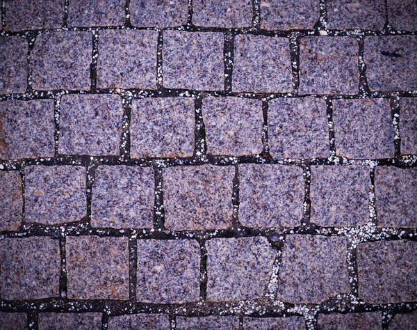 ビネットと灰色の玉石タイル張りの歩道舗装 テクスチャ — ストック写真