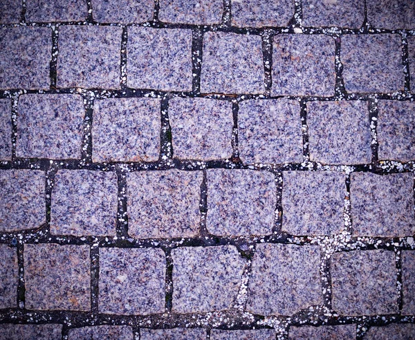 ビネットと灰色の玉石タイル張りの歩道舗装 テクスチャ — ストック写真