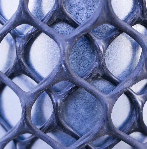 iron rhombus shape caged covering net. industrial, background.