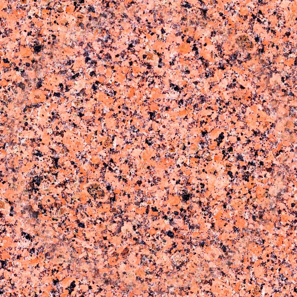 seamless red granite with black spots background. texture, pattern.
